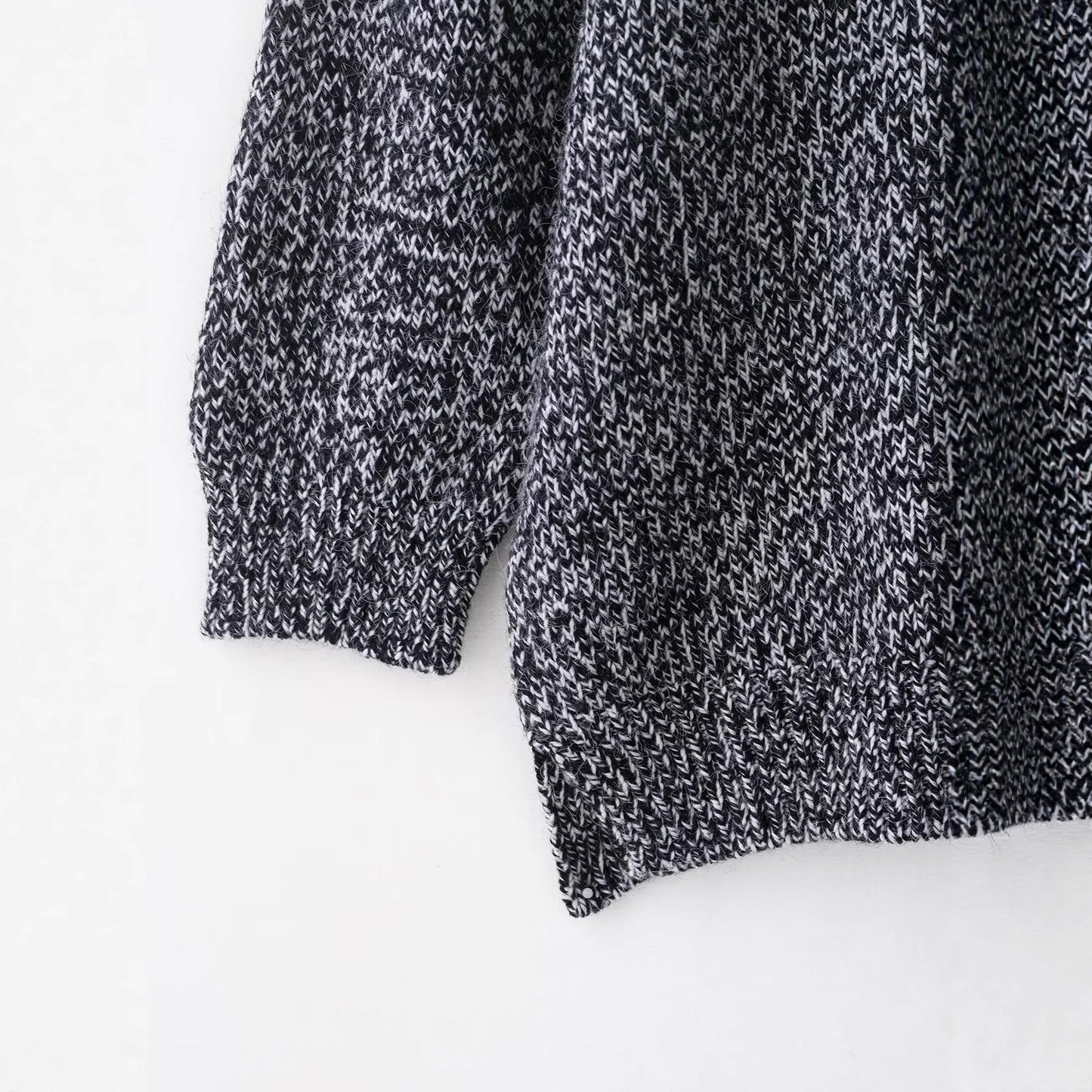 Round neck nine sleeves single breasted solid color knitted sweater for women